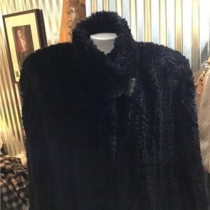 Luxurious Black authentic fur coat.   Swing cut.   Cut out detail base& sleeve.